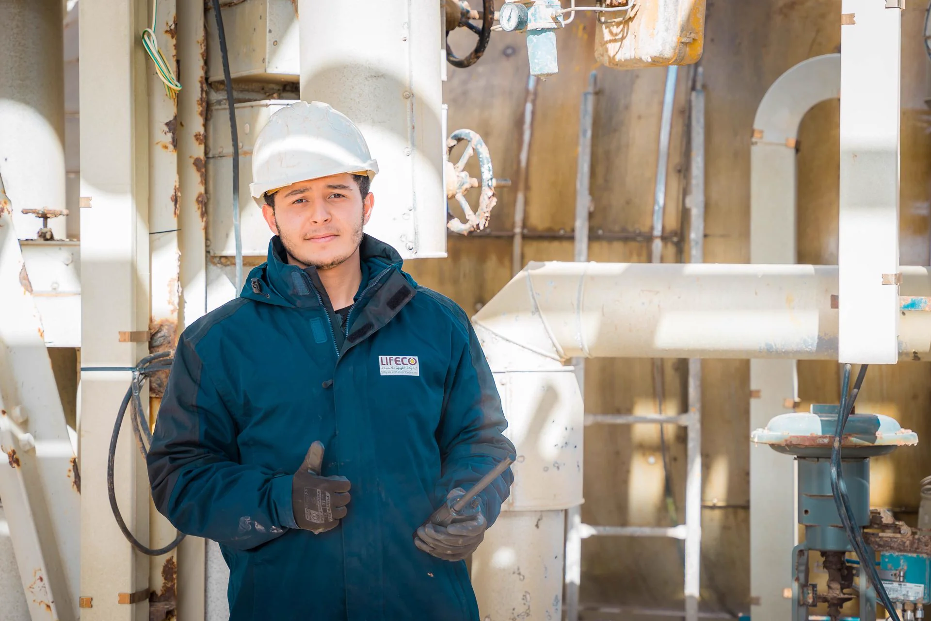 Engineer in PPE at an industrial facility, representative of the Fuels Safety Compliance program